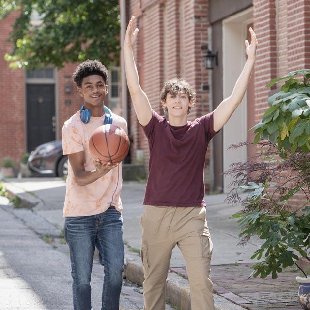 Common Questions-2 boys play basketball
