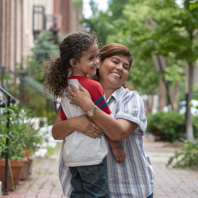 Common Questions-parent hugs daughter